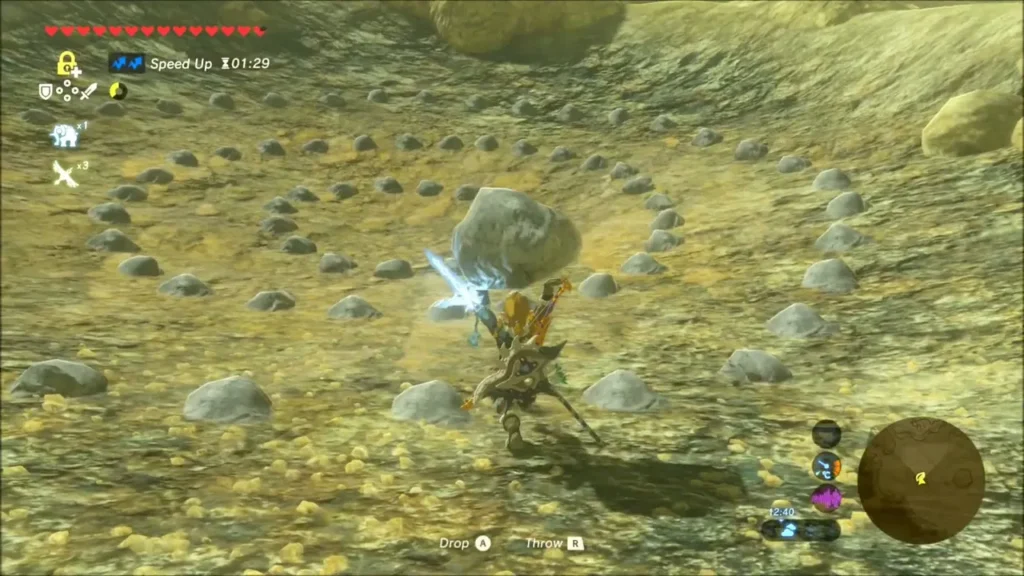 Link carrying a stone beside a ring of small stones in Gisa Crater Link carrying a stone beside a ring of small stones in Gisa Crater