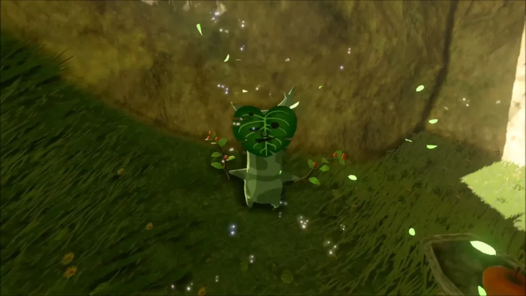 A Korok appearing in a burst of leaves beside a rock wall A Korok appearing in a burst of leaves beside a rock wall