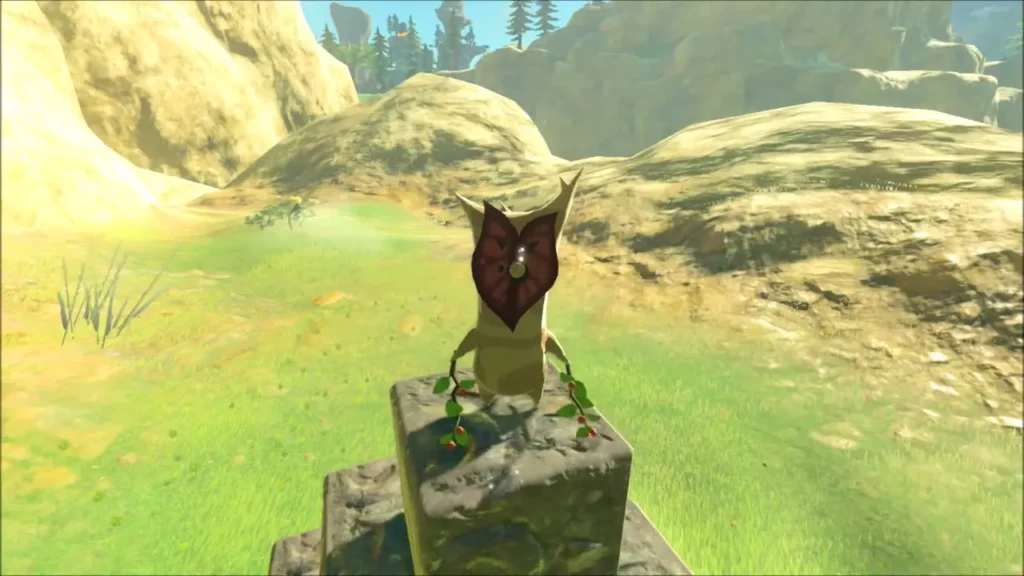 A Korok standing on top of the finished stone pyramid A Korok standing on top of the finished stone pyramid