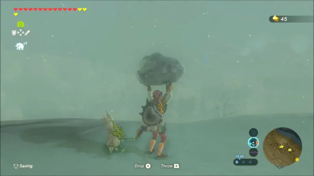 Link lifting a boulder on a snowy ledge beside a Korok Link lifting a boulder on a snowy ledge beside a Korok