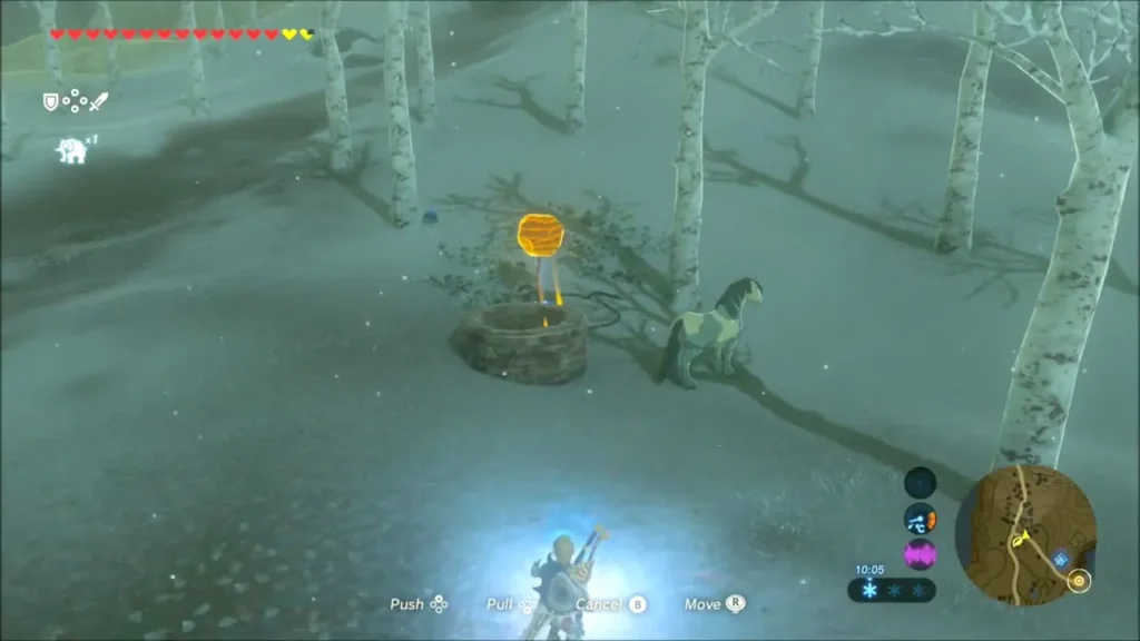 Link using Magnesis to lift an orange object beside a stone ring Link using Magnesis to lift an orange object beside a stone ring