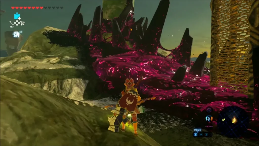 Link beside purple Malice goo at the foot of Tabantha Tower Link beside purple Malice goo at the foot of Tabantha Tower