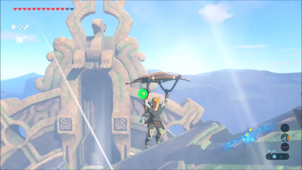 Link gliding past the carved tower on top of Vah Medoh Link gliding past the carved tower on top of Vah Medoh