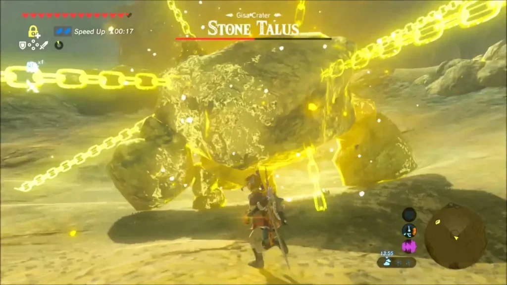 Stone Talus frozen in glowing yellow Stasis chains as Link stands before it Stone Talus frozen in glowing yellow Stasis chains as Link stands before it