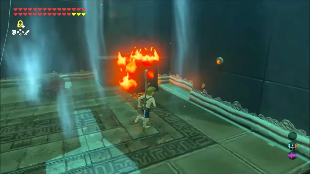 Link running past a burning crate in a stone hall with updrafts Link running past a burning crate in a stone hall with updrafts