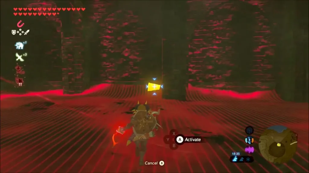 Link using Magnesis in the dark arena, a metal chest glowing yellow ahead Link using Magnesis in the dark arena, a metal chest glowing yellow ahead