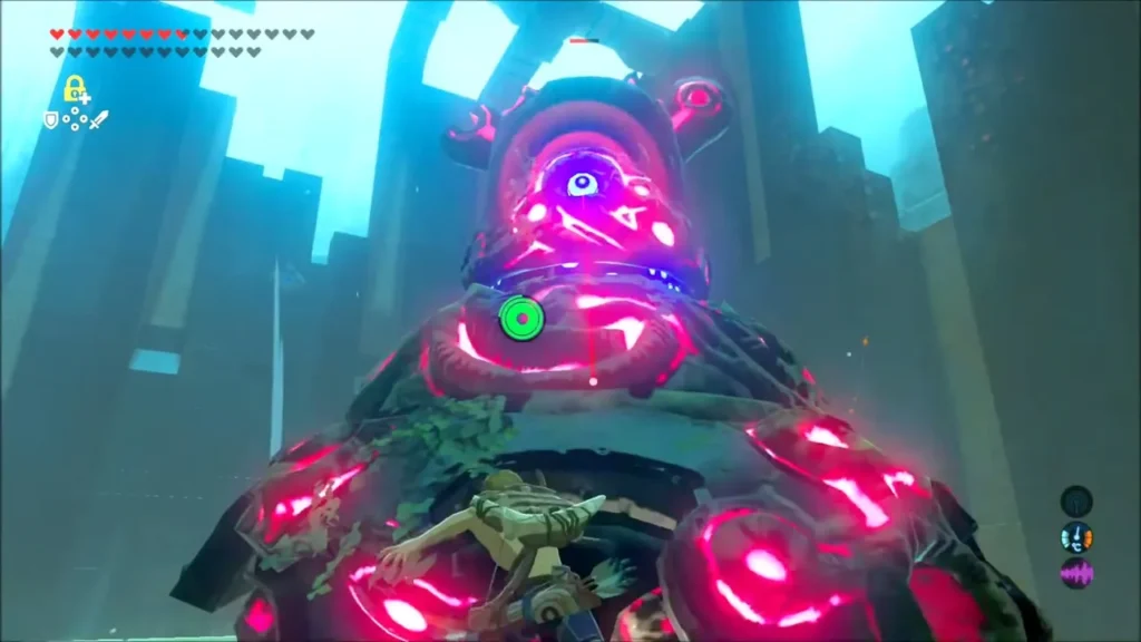 A Decayed Guardian looming over Link with its eye glowing in the arena A Decayed Guardian looming over Link with its eye glowing in the arena