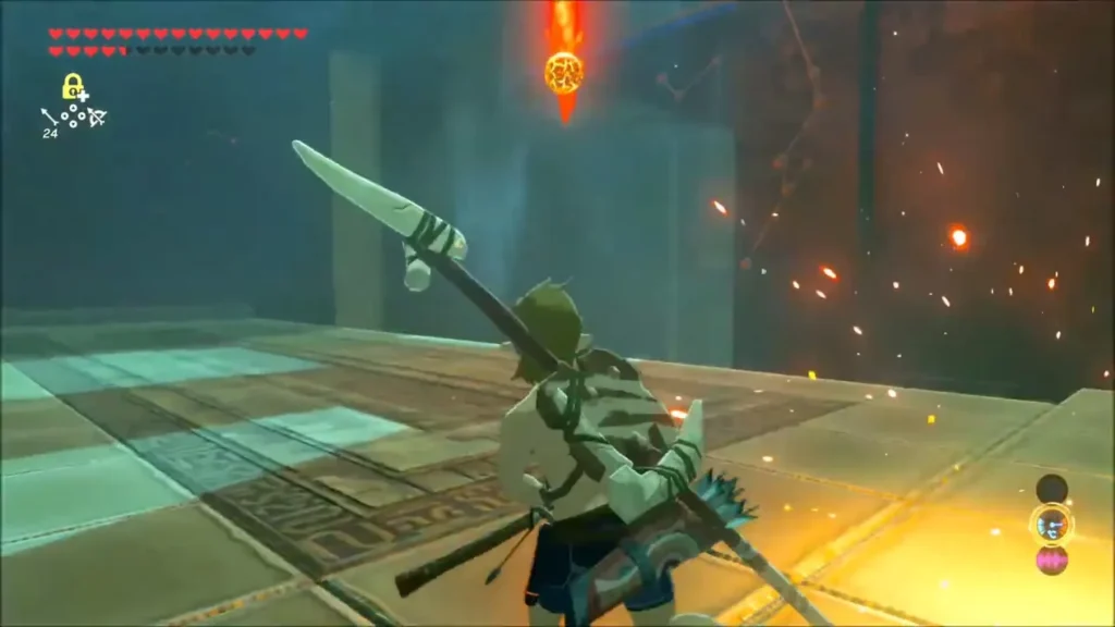 Link with a spear in a trial room as a burning rock drops from above Link with a spear in a trial room as a burning rock drops from above