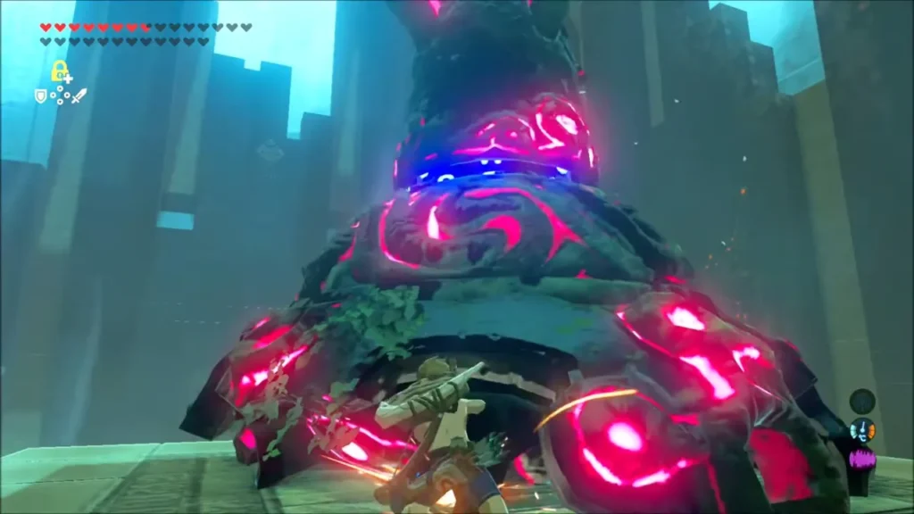 Link beside the glowing pink legs of the Decayed Guardian Link beside the glowing pink legs of the Decayed Guardian