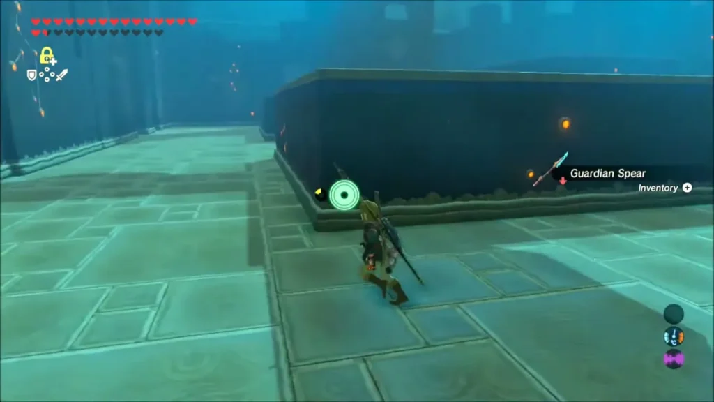 Link walking past a dropped Guardian Spear with its pickup prompt Link walking past a dropped Guardian Spear with its pickup prompt