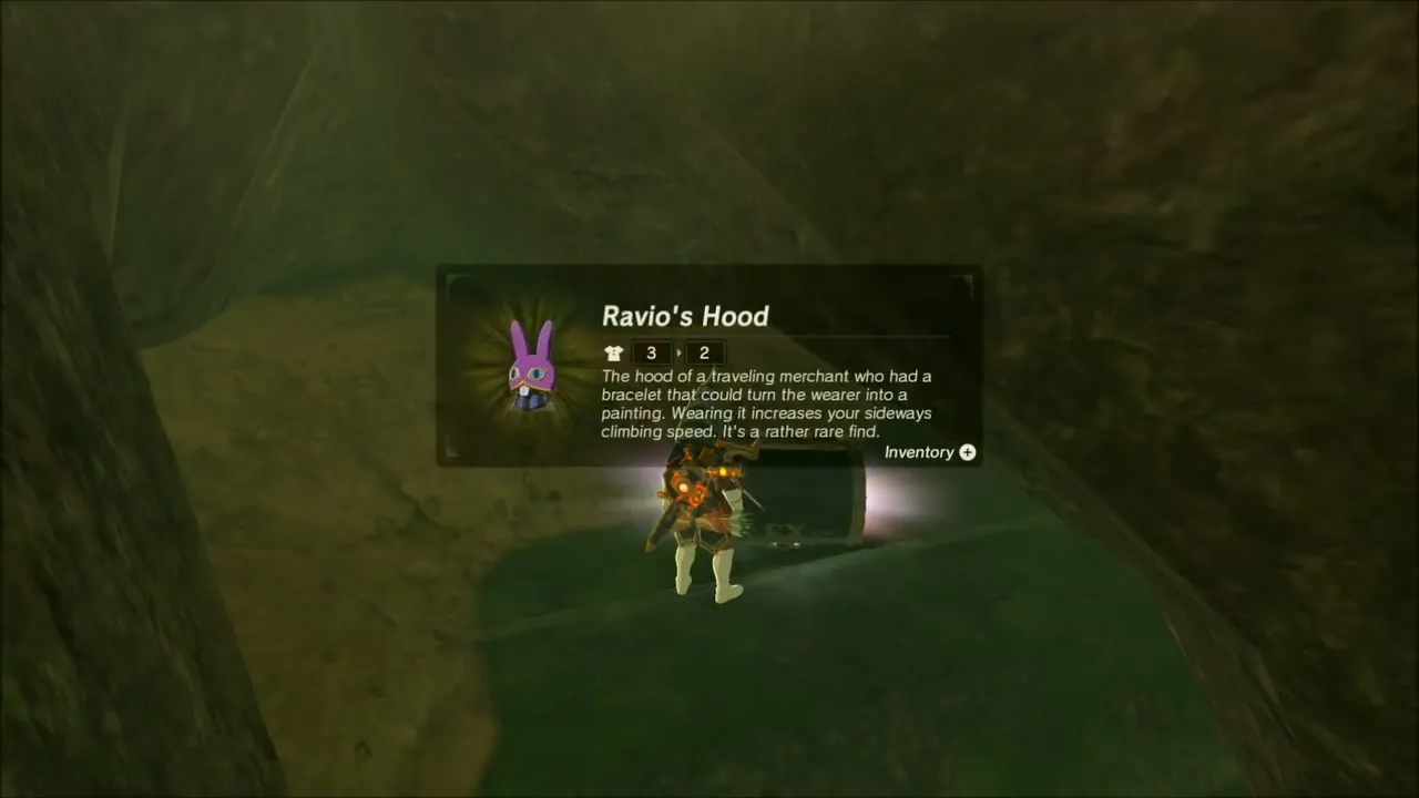 Link holding up Ravio's Hood with its item box Link holding up Ravio's Hood with its item box