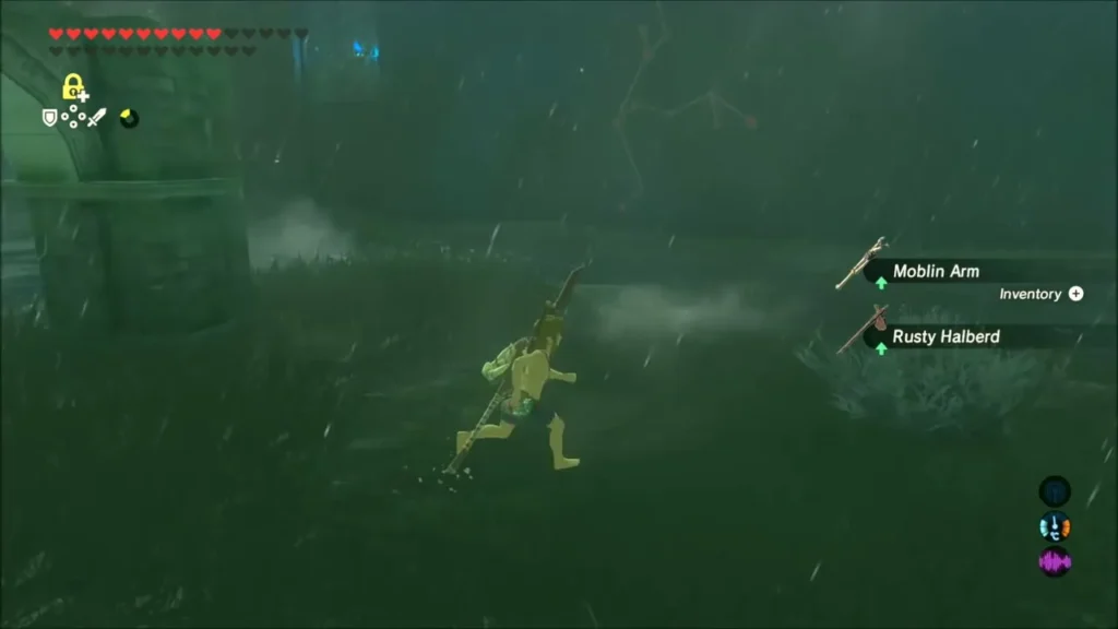 Link running past a Rusty Halberd and Moblin Arm on the marsh ground Link running past a Rusty Halberd and Moblin Arm on the marsh ground