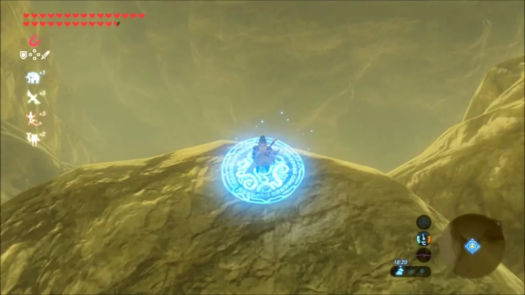 Link arriving on a glowing blue warp marker on a rocky hilltop Link arriving on a glowing blue warp marker on a rocky hilltop