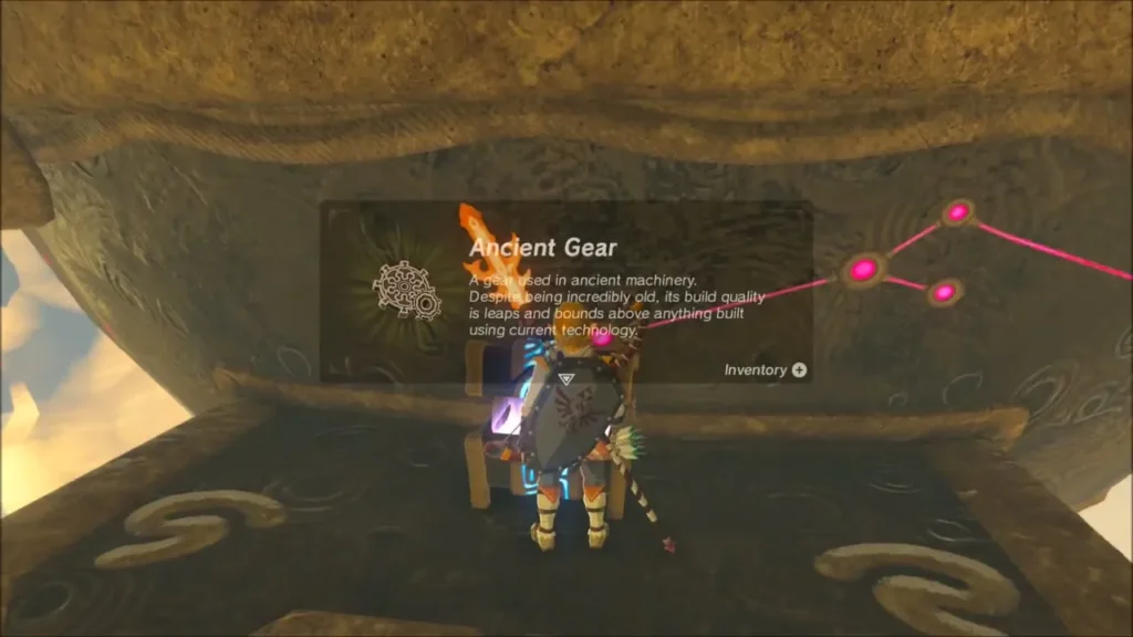 Link receiving an Ancient Gear from a chest during the climb Link receiving an Ancient Gear from a chest during the climb