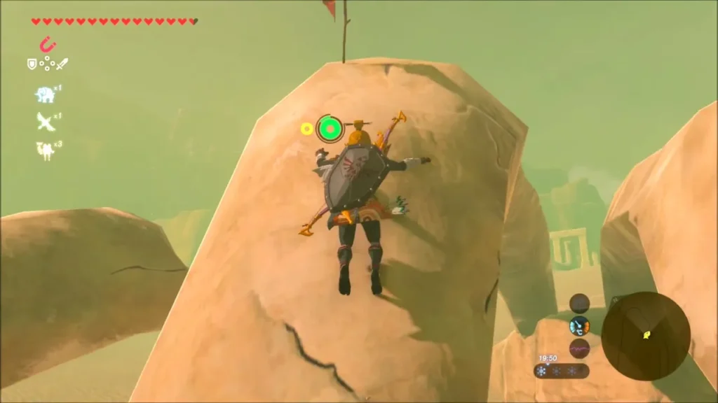 Link near the top of the boulder where a sparkle marks the Korok Link near the top of the boulder where a sparkle marks the Korok