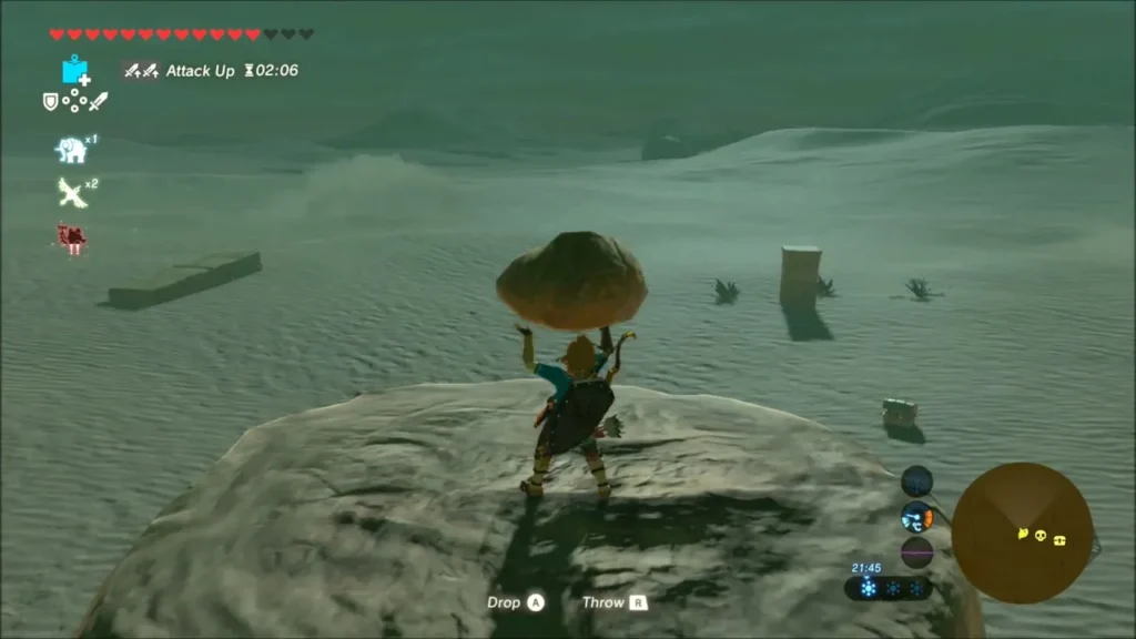 Link carrying a boulder on top of a sand mound in the desert Link carrying a boulder on top of a sand mound in the desert