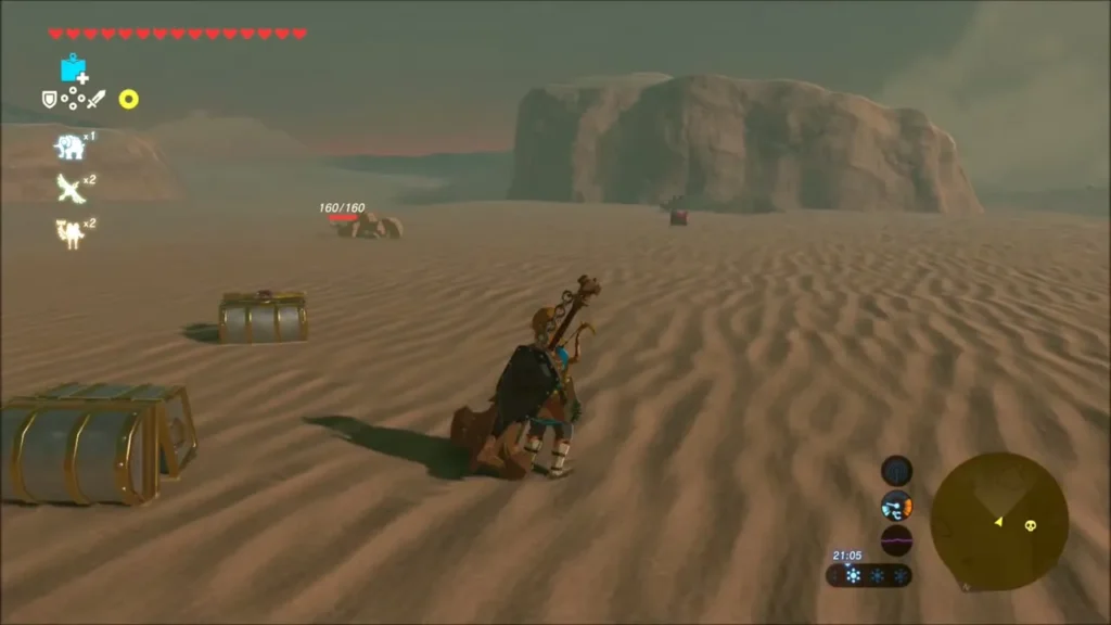 Two chests sitting on the dunes where the Molduga fell Two chests sitting on the dunes where the Molduga fell