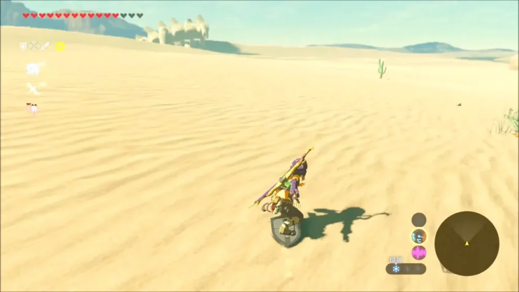 Link sand-sailing over the dunes, giant ribs on the horizon Link sand-sailing over the dunes, giant ribs on the horizon