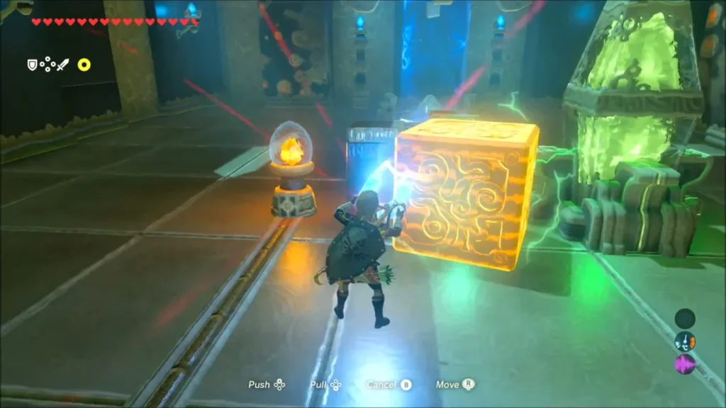 Link using Magnesis to move an electrified block in the first room Link using Magnesis to move an electrified block in the first room