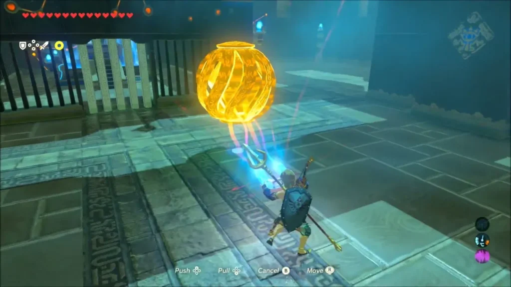 Link using Magnesis to carry the glowing electric orb inside the shrine Link using Magnesis to carry the glowing electric orb inside the shrine