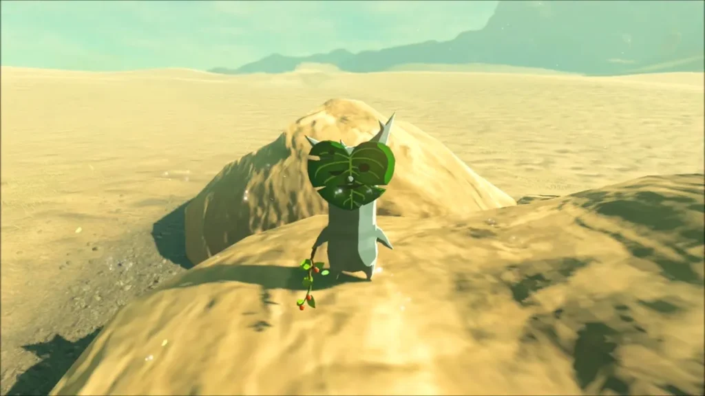 A Korok standing on a cluster of sandstone rocks in the desert A Korok standing on a cluster of sandstone rocks in the desert