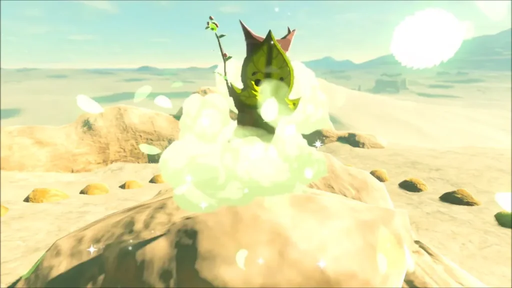 Korok appearing on a rock ringed with small round stones Korok appearing on a rock ringed with small round stones