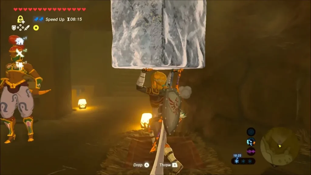 Link lifting a large block of ice above his head inside the icehouse Link lifting a large block of ice above his head inside the icehouse