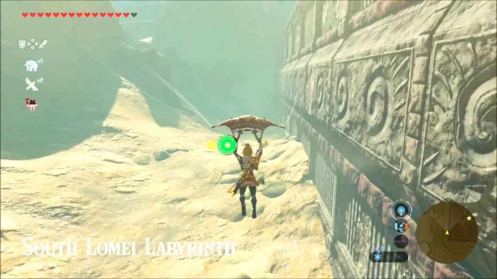 Link gliding beside the carved outer wall of the South Lomei Labyrinth Link gliding beside the carved outer wall of the South Lomei Labyrinth
