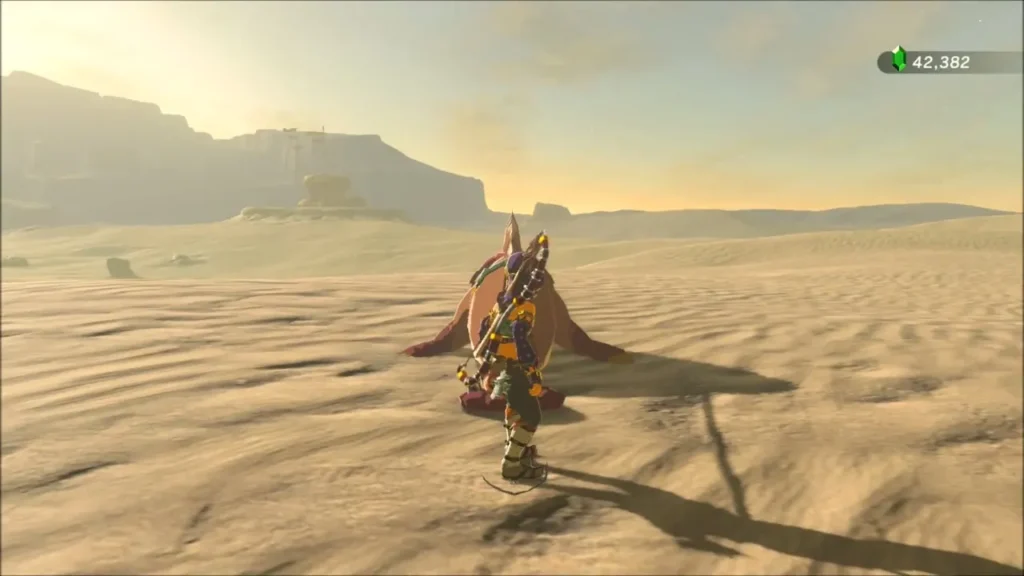 Link beside a sand seal on the open desert dunes Link beside a sand seal on the open desert dunes