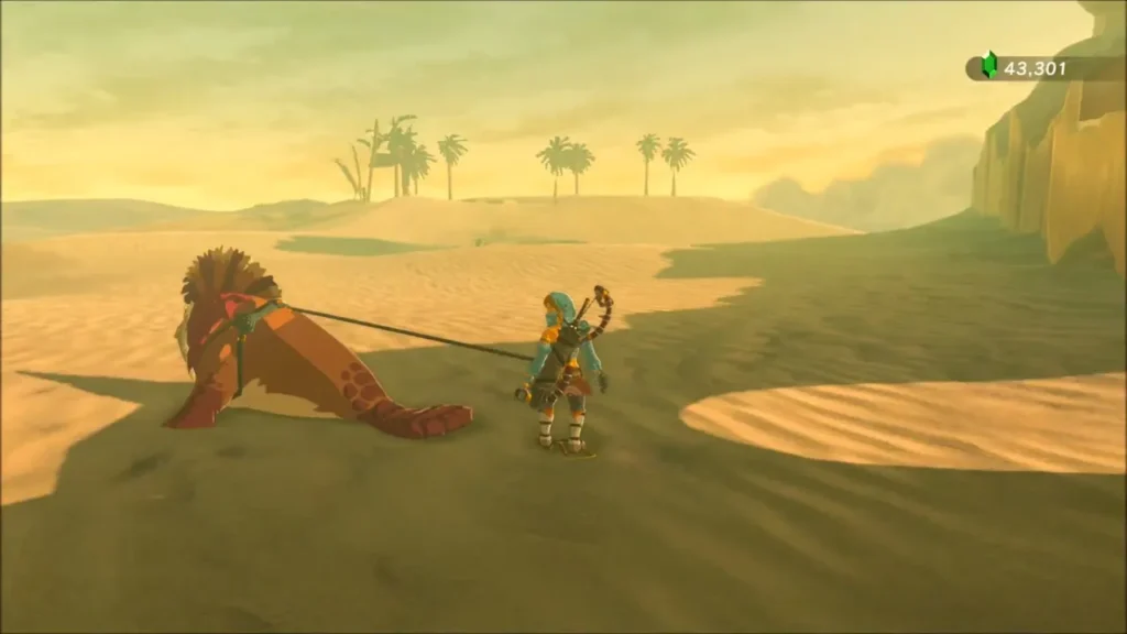 Link standing beside his rented sand seal on the open dunes Link standing beside his rented sand seal on the open dunes