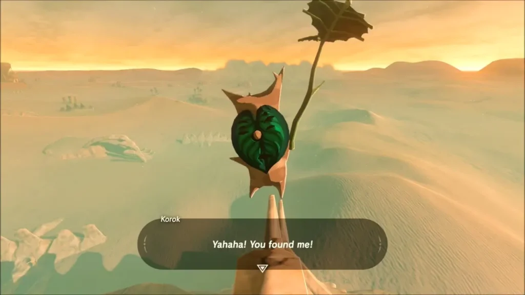 A Korok at the top of the rock spire saying you found me A Korok at the top of the rock spire saying you found me