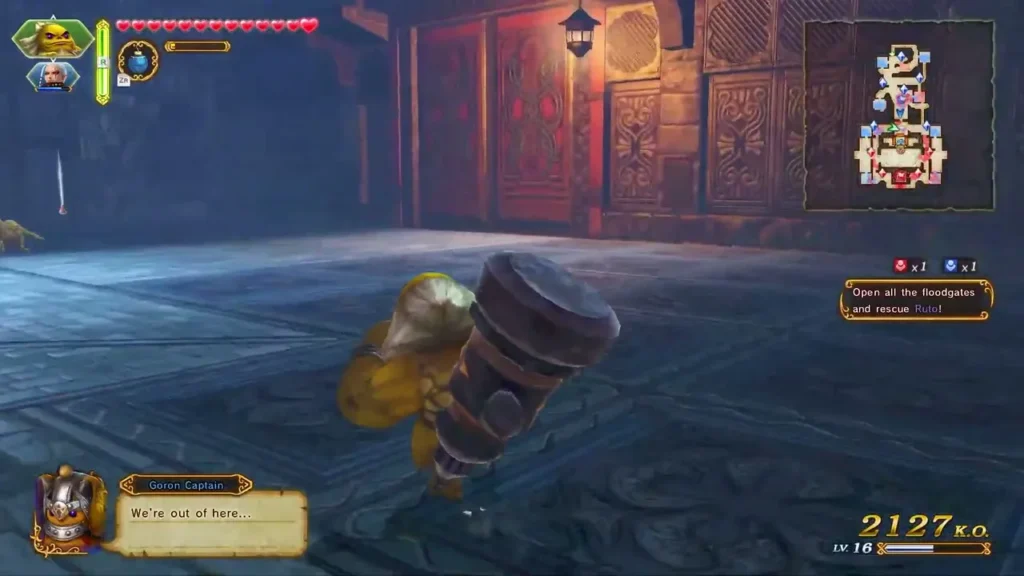 A Goron with a giant hammer hurries through the Central Hall as the floodgates objective shows A Goron with a giant hammer hurries through the Central Hall as the floodgates objective shows