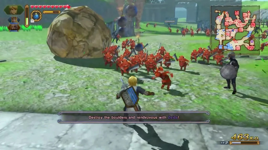 A banner says to destroy the boulders and rendezvous with Zelda while Link leads the soldiers