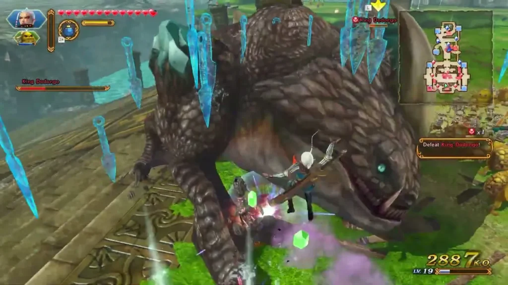 Link fights King Dodongo on a grassy field beside a crystal wall Link fights King Dodongo on a grassy field beside a crystal wall