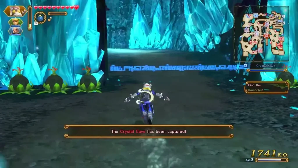 Banner reads The Crystal Cave has been captured as Link stands in the cave Banner reads The Crystal Cave has been captured as Link stands in the cave