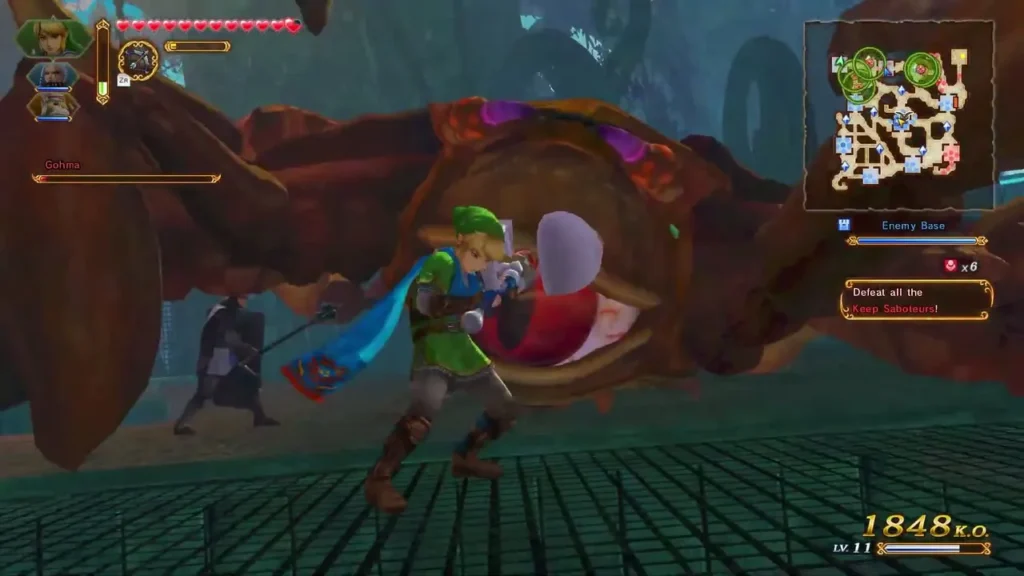 Link stands in front of Gohma's open red mouth during a forest battle Link stands in front of Gohma's open red mouth during a forest battle