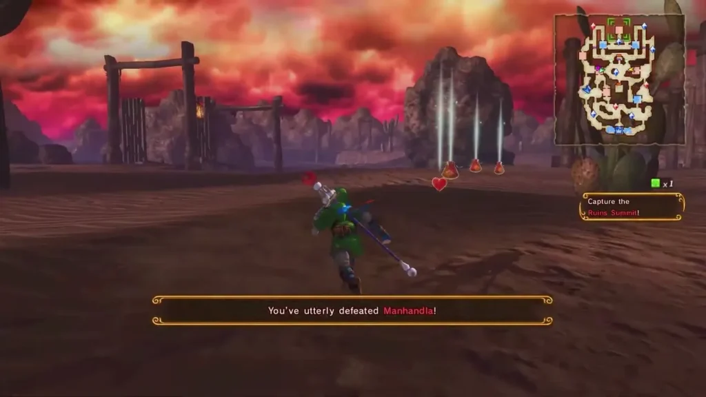 The banner reads You've utterly defeated Manhandla! as Link stands on the field
