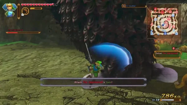 Banner reads Attack The Imprisoned's toes as Link strikes at the giant's foot Banner reads Attack The Imprisoned's toes as Link strikes at the giant's foot