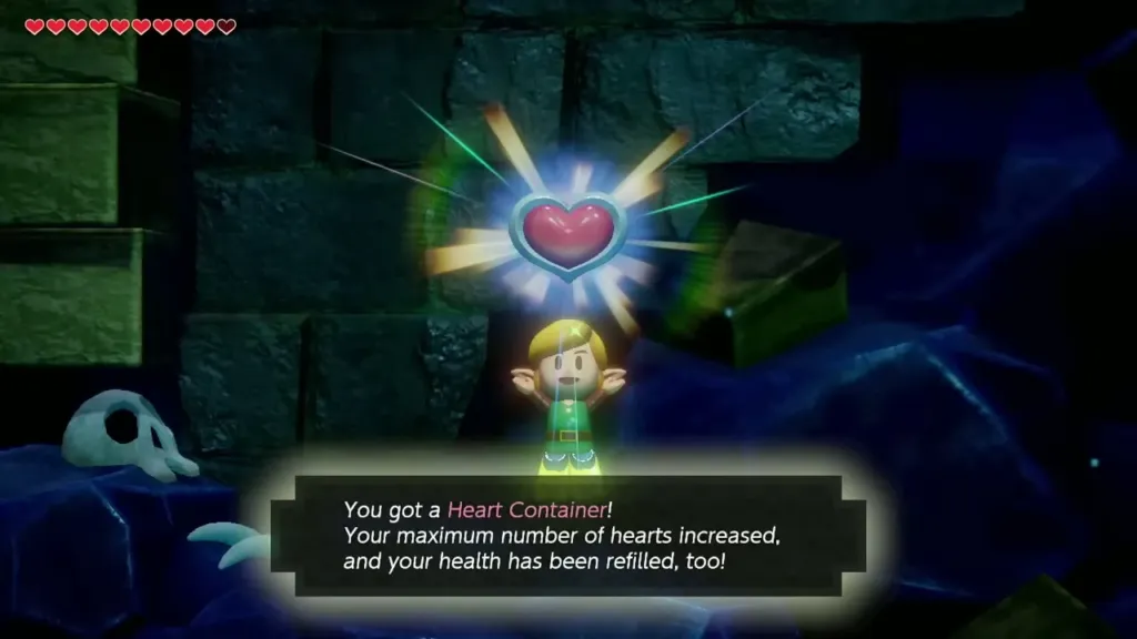 Link holding up the Heart Container with the item message box shown in full Link holding up the Heart Container with the item message box shown in full