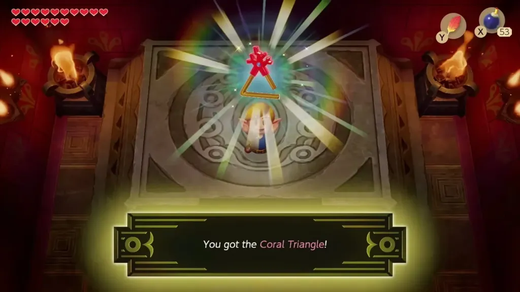 Link holding up the Coral Triangle with its item message box shown in full Link holding up the Coral Triangle with its item message box shown in full