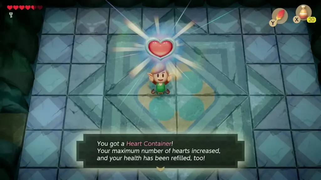 Link holding up the Heart Container with the item message box shown in full Link holding up the Heart Container with the item message box shown in full