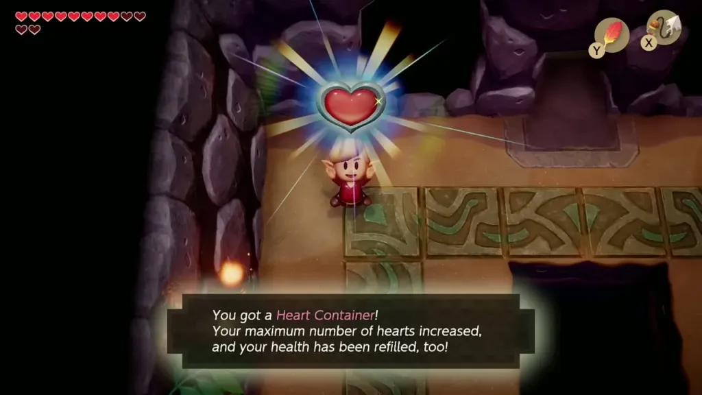 Link holding up the Heart Container with the item message box shown in full Link holding up the Heart Container with the item message box shown in full