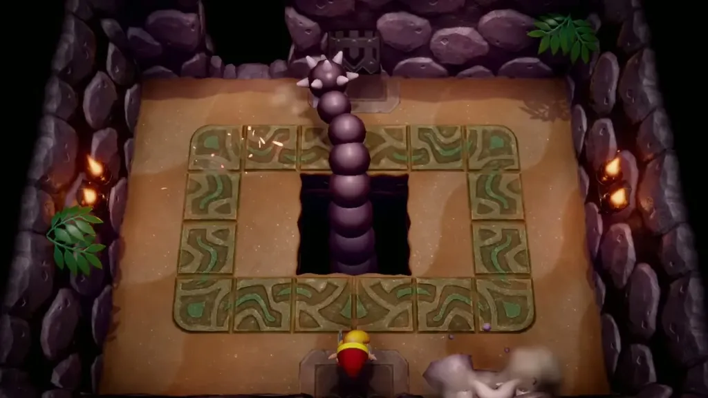 The Slime Eel's spiked tail rising from the central pit as Link waits at the ring's edge The Slime Eel's spiked tail rising from the central pit as Link waits at the ring's edge