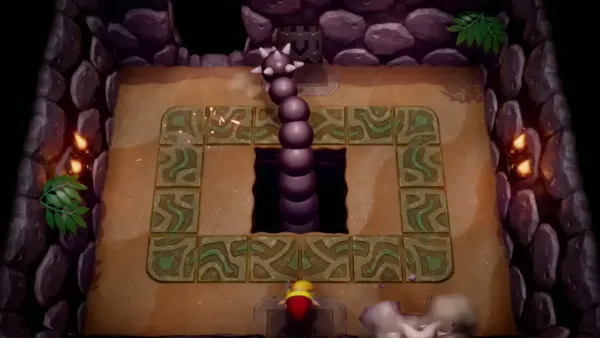 The Slime Eel's spiked tail rising from the central pit as Link waits at the ring's edge The Slime Eel's spiked tail rising from the central pit as Link waits at the ring's edge