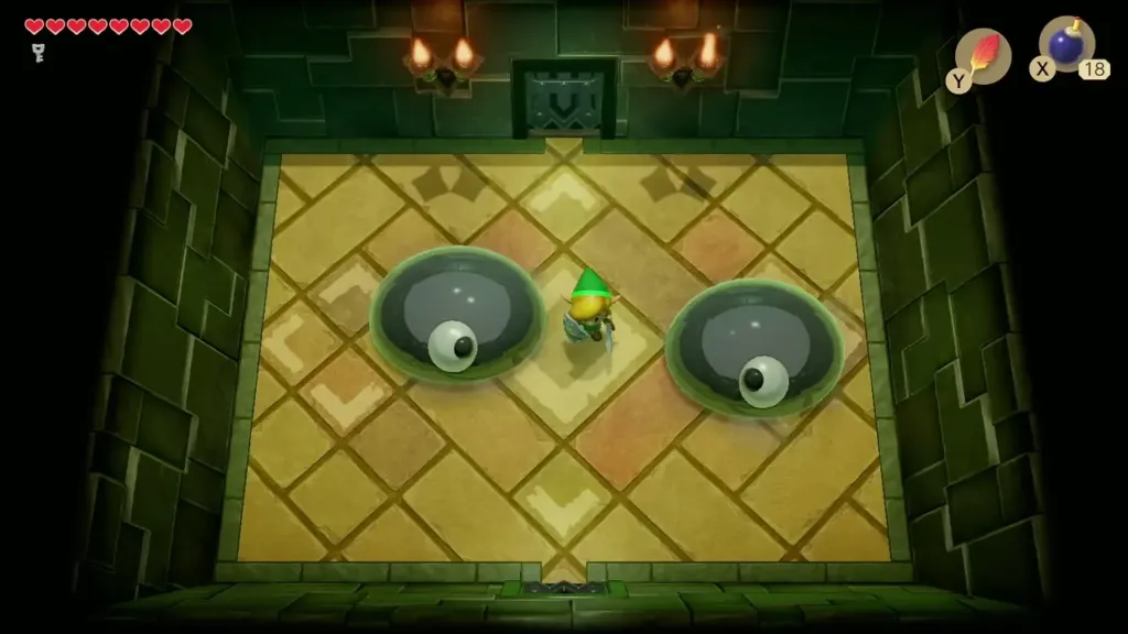 The Slime Eye split into two halves with Link between them The Slime Eye split into two halves with Link between them