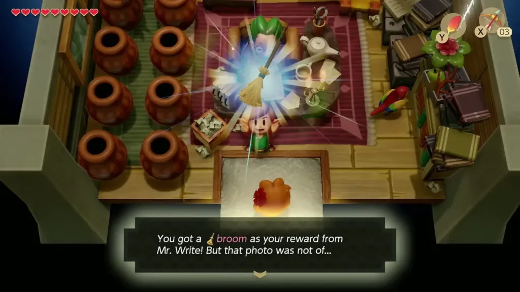 Link holding up the Broom as Mr. Write's reward with the item message Link holding up the Broom as Mr. Write's reward with the item message