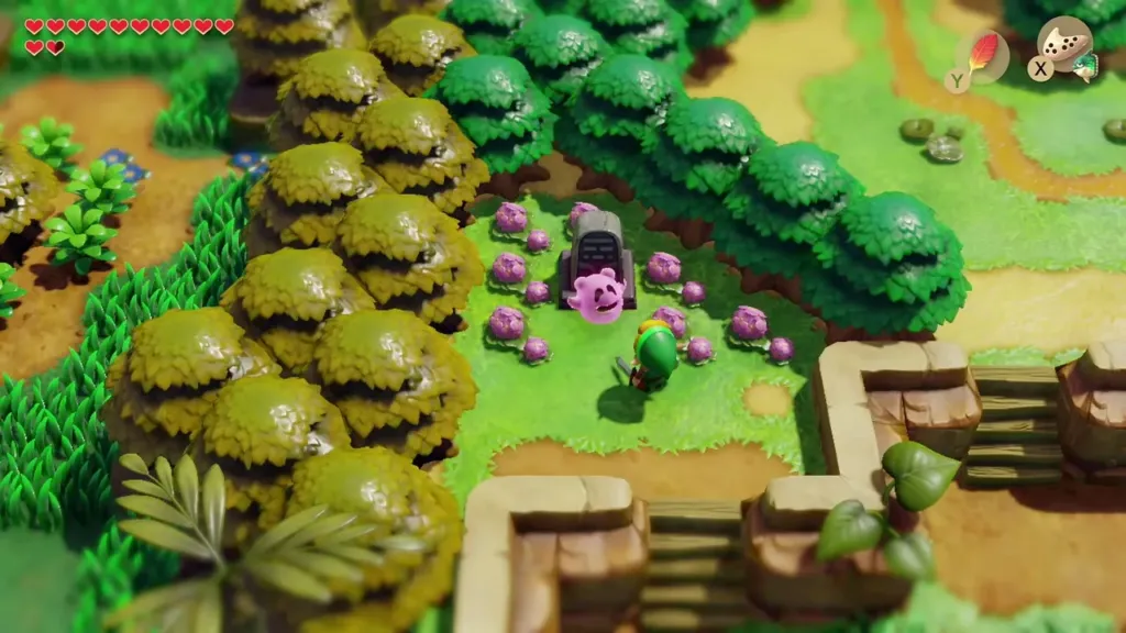 The pink ghost beside its grave in a flowered clearing with Link nearby The pink ghost beside its grave in a flowered clearing with Link nearby