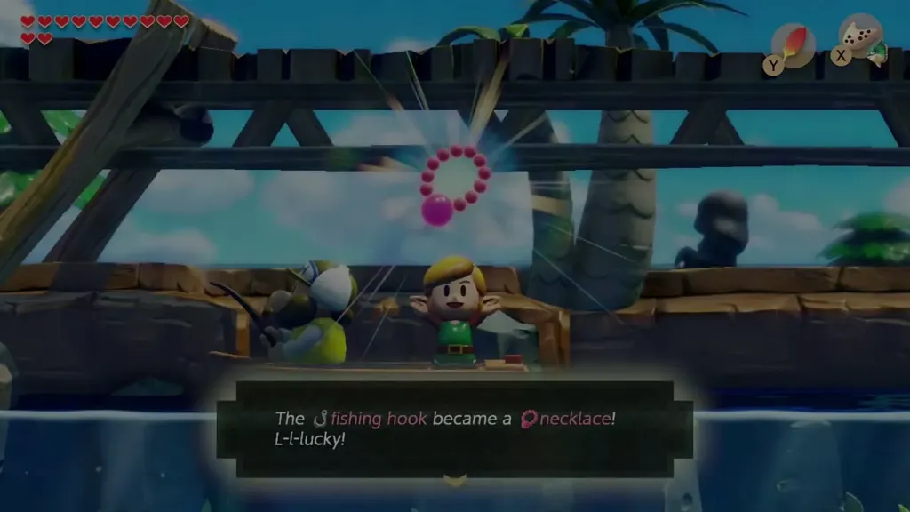 Link holding up the necklace beside the Fisherman after his hook is swapped Link holding up the necklace beside the Fisherman after his hook is swapped