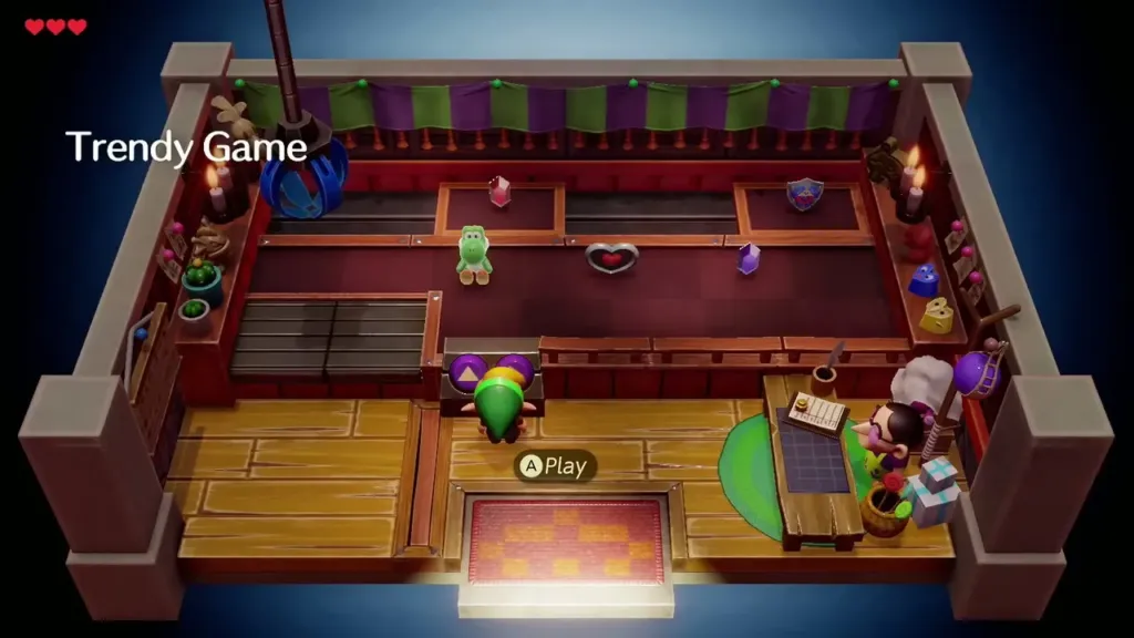 Link at the Trendy Game counter facing the crane machine and its operator Link at the Trendy Game counter facing the crane machine and its operator