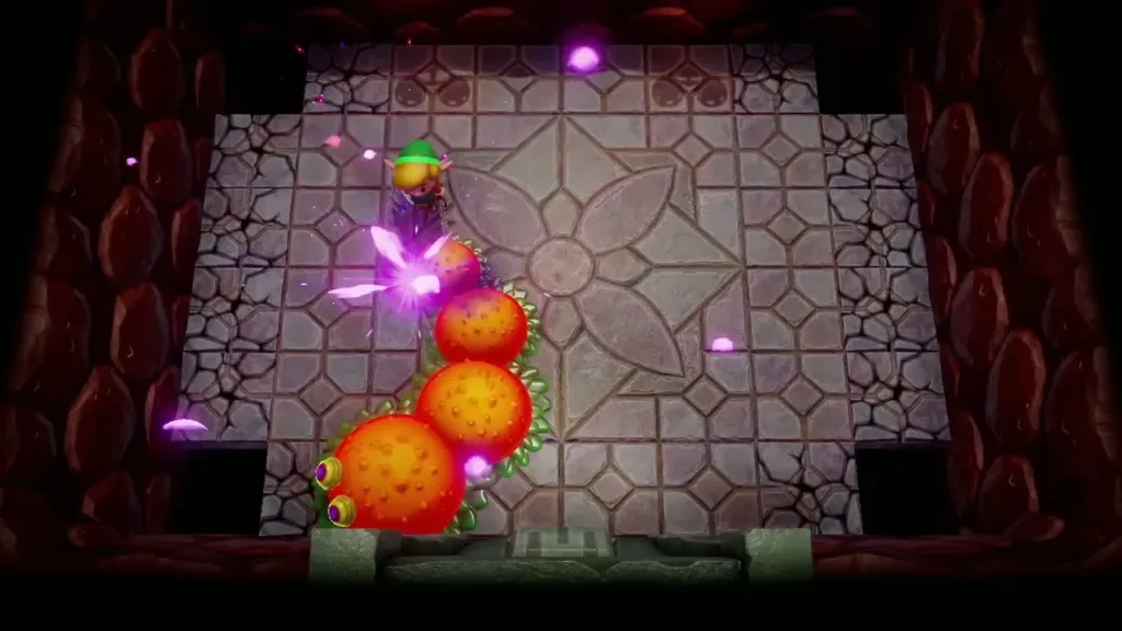 Link fighting a fiery caterpillar in a room of a chamber dungeon he built Link fighting a fiery caterpillar in a room of a chamber dungeon he built